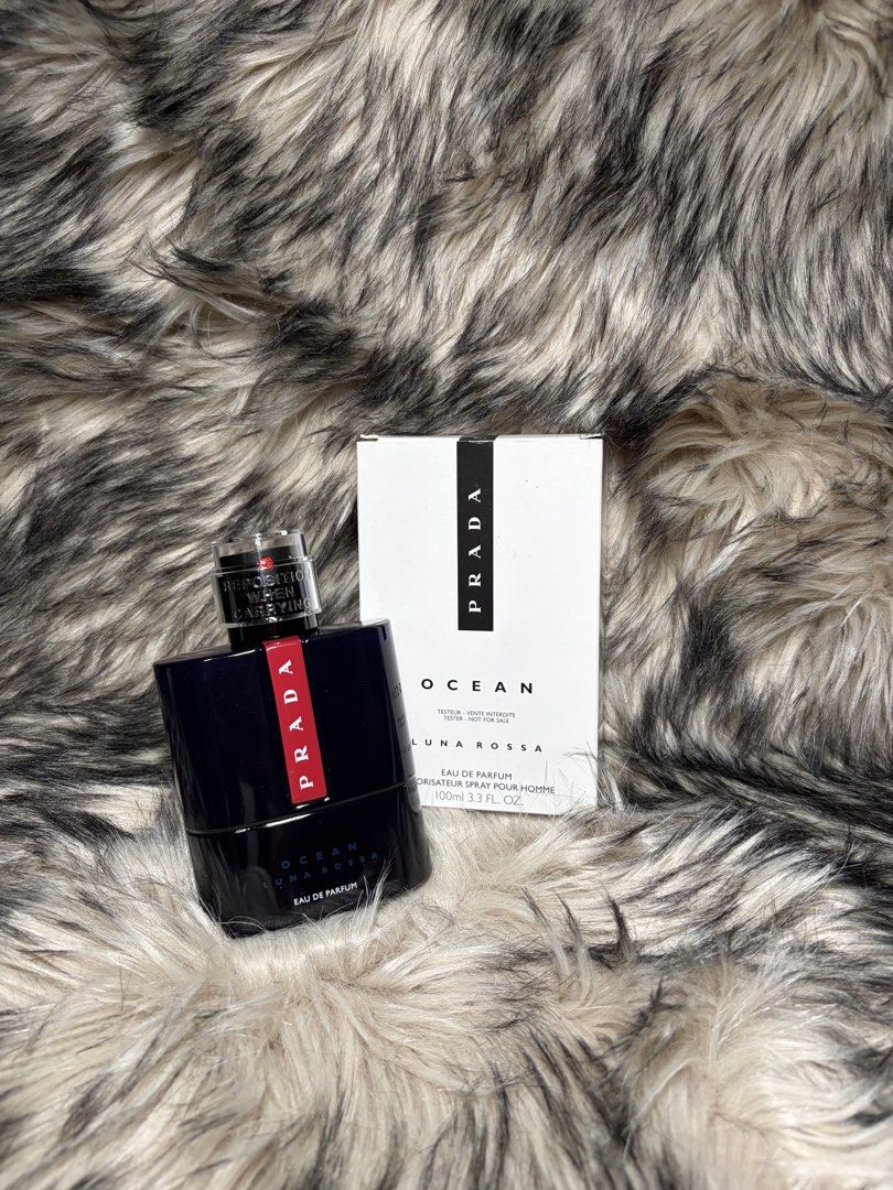 Prada Luna Rossa Ocean Eau de Parfum 100ml (Category: Fragrance & Deodorants) located in Muntinlupa City. Submitted by charizze21 (Listing ID 1467606288, Image 1). Description: - Brand: Prada Luna Rossa Ocean Eau de Parfum for Men - Size: 100ml full-size bottle (barely sprayed) - Packaging: Comes with matching tester box (marked "Not for Sale") - Bottle: Dark navy blue glass with signature red stripe - Scent Profile: Fresh, clean, and versatile -