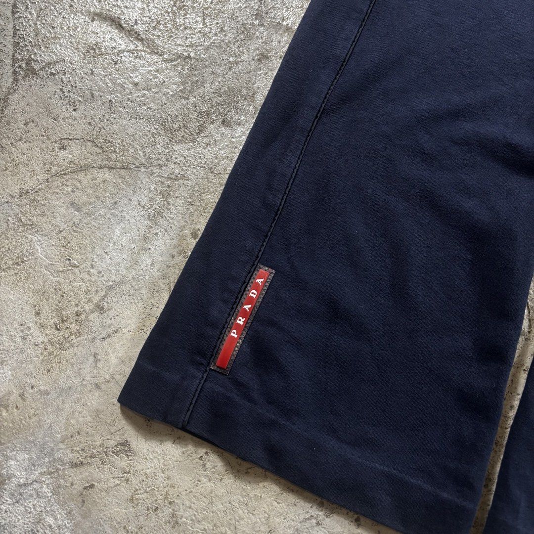 Prada Navy Blue Sweatpants Size XS (Category: Luxury Apparel) located in Caloocan City. Submitted by thrift.crcl (Listing ID 1467777758, Image 2). Description: - Brand: Prada - Item: Cotton Sweatpants - Color: Dark Navy Blue - Size: XS - Features: Drawstring waist, signature red Prada logo tag near bottom hem - Condition: Clean interior tags and branding details clearly shown - Authentic and comfortable for everyday wear Size 28-30 Length 39 .