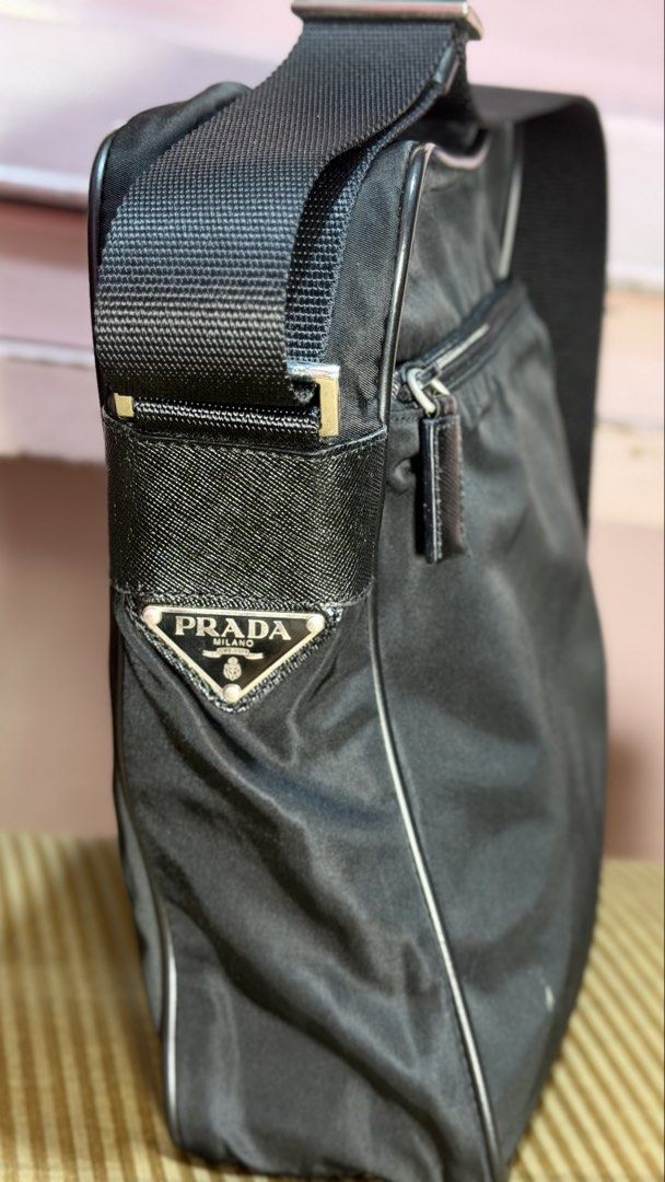 Prada Nylon Crossbody Bag (Category: Luxury Bags & Wallets) located in Caloocan City. Submitted by prof_music1979 (Listing ID 1454507516, Image 1). Description: - Authentic Prada crossbody bag - Made in Italy - Durable nylon with leather trim - Zippered main compartment - Front zip pocket - Adjustable strap - Interior zip pocket - Prada logo tag - Ideal for everyday use.
