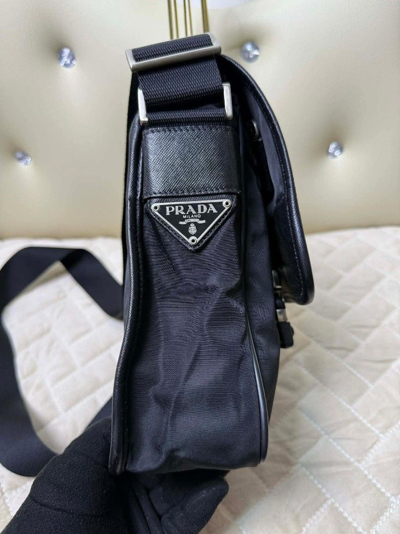 Prada Nylon messenger bag (Category: Luxury Bags & Wallets) located in Iloilo. Submitted by jananapad (Listing ID 1467610553, Image 3). Description: Well used condition GUARANTEED ORIGINAL #8.