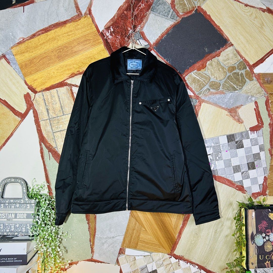 Prada quilted jacket (Category: Luxury Apparel) located in Baguio. Submitted by kckc_luxury (Listing ID 1467754381, Image 1). Description: 🌸 TINY PINK SPOTS ARE LENS DAMAGE, NOT CLOTH STAINS ————————— ❗️KINDLY READ BEFORE MAKING AN OFFER❗️ LISTING DETAILS size:Large width x length (inches):25x28 condition: EXCELLENT --- MOP: Gcash / BPI MOD: J&T / JRS LOCATION: Baguio City --- NOTE: • Manage your expectations • Photos did not go under any edit b