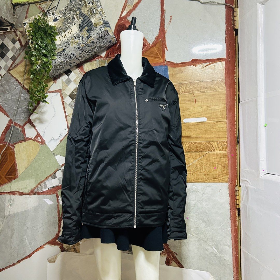 Prada quilted jacket (Category: Luxury Apparel) located in Baguio. Submitted by kckc_luxury (Listing ID 1467754381, Image 2). Description: 🌸 TINY PINK SPOTS ARE LENS DAMAGE, NOT CLOTH STAINS ————————— ❗️KINDLY READ BEFORE MAKING AN OFFER❗️ LISTING DETAILS size:Large width x length (inches):25x28 condition: EXCELLENT --- MOP: Gcash / BPI MOD: J&T / JRS LOCATION: Baguio City --- NOTE: • Manage your expectations • Photos did not go under any edit b
