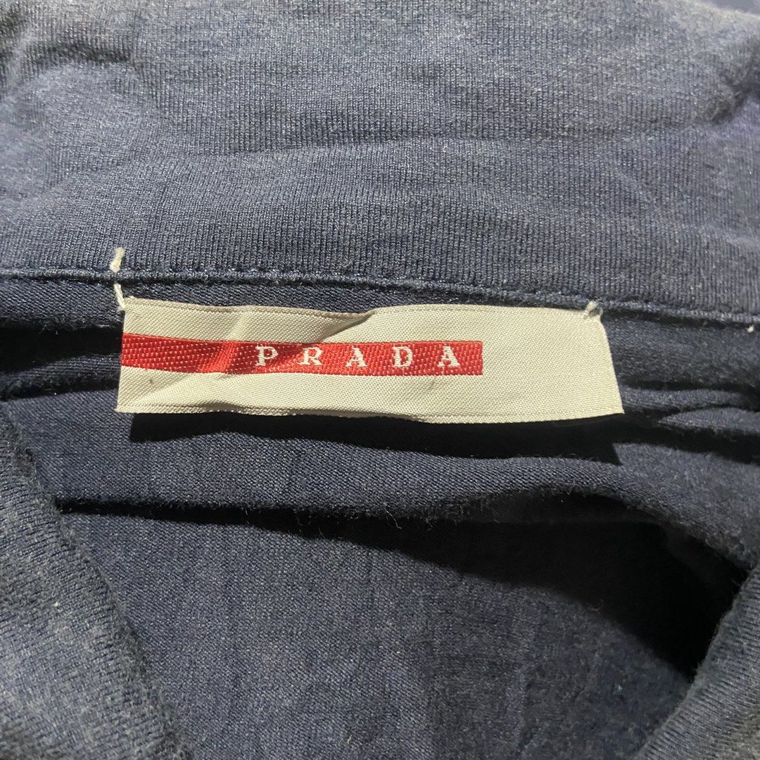 Prada Red Tab Polo Shirt (Category: Tshirts & Polo Shirts ) located in Bacolod City. Submitted by c4pitalism_goods (Listing ID 1467747154, Image 3). Description: Size Xlarge Width 23 Length 31.