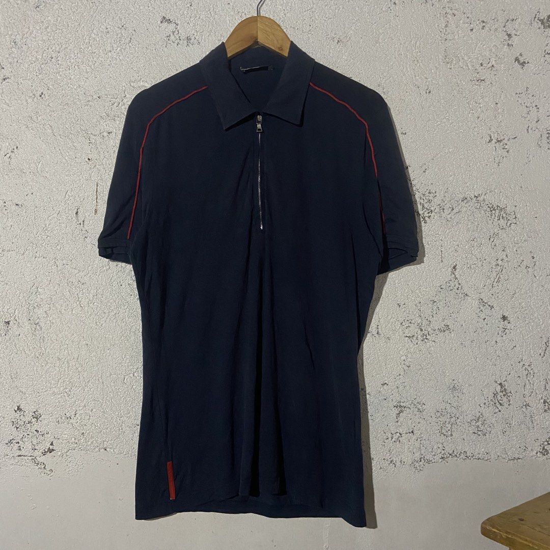 Prada Red Tab Polo Shirt (Category: Tshirts & Polo Shirts ) located in Bacolod City. Submitted by c4pitalism_goods (Listing ID 1467747154, Image 1). Description: Size Xlarge Width 23 Length 31.