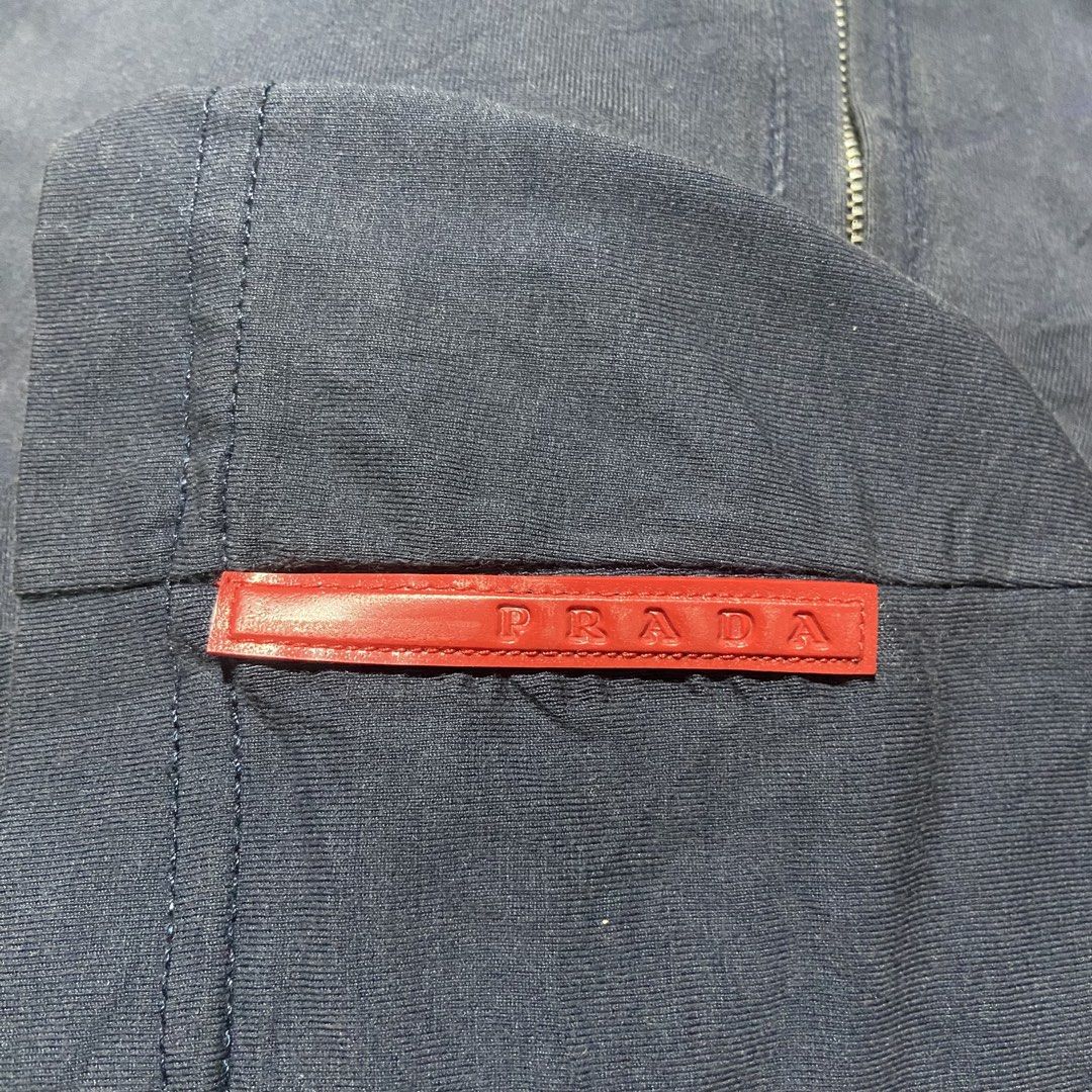 Prada Red Tab Polo Shirt (Category: Tshirts & Polo Shirts ) located in Bacolod City. Submitted by c4pitalism_goods (Listing ID 1467747154, Image 2). Description: Size Xlarge Width 23 Length 31.