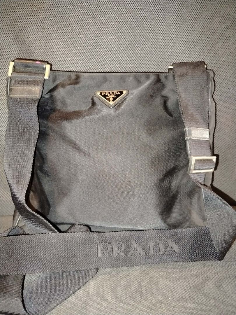Prada Tessuto Nylon Crossbody Black (Category: Luxury Bags & Wallets) located in Caloocan City. Submitted by luxesavvy63110 (Listing ID 1467767878, Image 1). Description: Authentic Prada black nylon crossbody with the classic enamel triangle logo. Adjustable Prada logo webbing strap with silver-tone buckles. Lightweight and roomy, great for everyday or travel. Almost new condition. Meetup or shipping available..