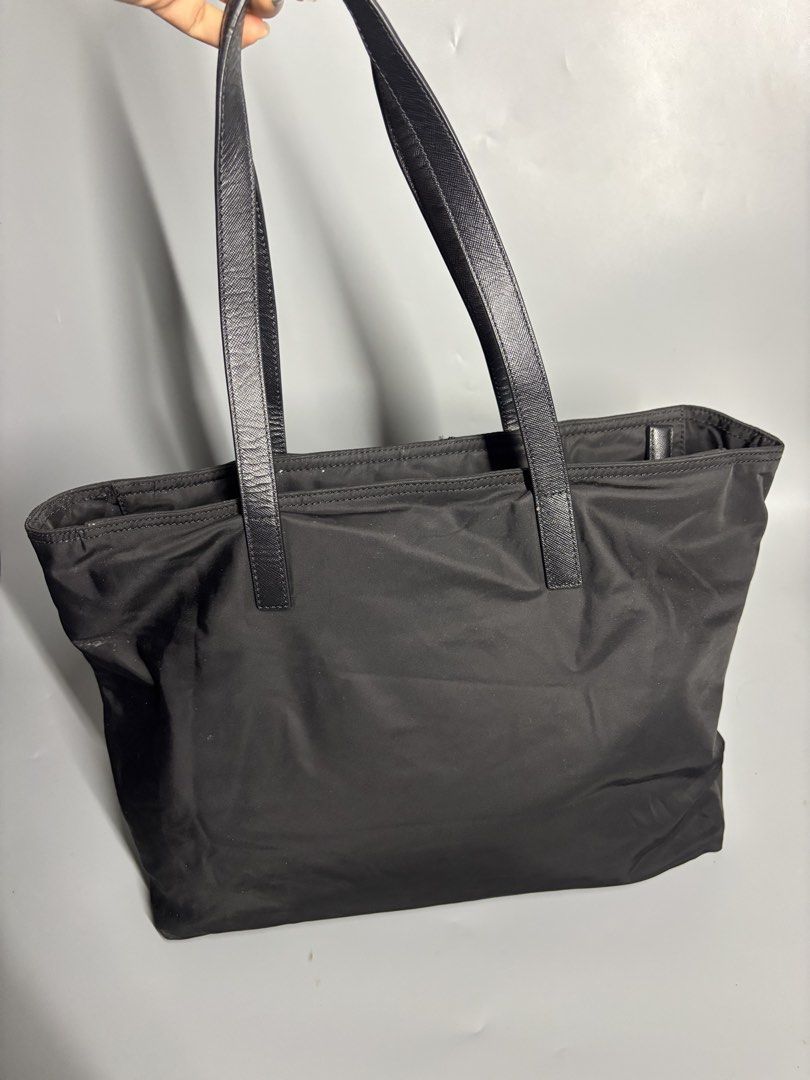 Prada Tote Bag (Category: Tote Bags) located in Cavite. Submitted by playerscollection (Listing ID 1467690691, Image 2). Description: Prada Tote Bag 9/10 Condition Excellent condition lampo zip 15k or best offer .
