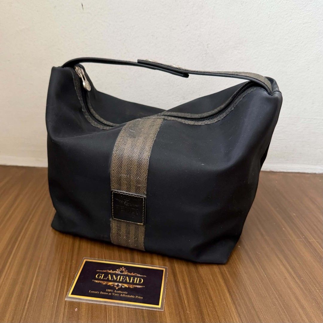 PRE OWNED AUTHENTIC FENDI FF PEQUIN BAG (Category: Luxury Bags & Wallets) located in Paranaque City. Submitted by Glamfahd (Listing ID 1467732979, Image 2). Description: Pre Owned Authentic FENDI Bag Inclusion/s: None Condition Well Used condition Marks on exterior Marks on interior Bag is really a great buy! Please manage your expectations as you are buying an authentic second hand item at a fraction of the cost.