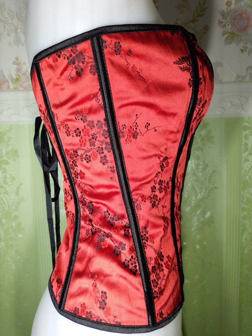 Preloved Chinese Design Magnetic Corset Top (Category: Others Tops) located in Dasmarinas. Submitted by ms.happycorsets (Listing ID 1467775182, Image 3). Description: Preloved Magnetic Corset Top Red and Black Color Can Fit Large size Starting waistline 32-34 inches Not Padded length 13 inches Not Stretchable Fabric Has Lace tie at the back Has 10 Soft bones with Slight flaws Actual Photo Color may Change due to Camera Flash 💕 Disregard the line
