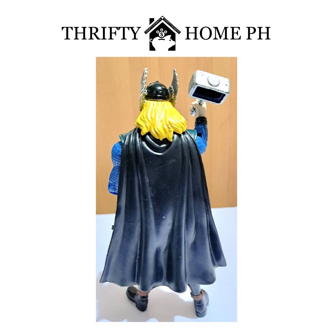 Preloved collectible action figure; Thor; interactive/movable arms & legs (Category: Other Merchandise) located in Manila. Submitted by thriftyhome_ph (Listing ID 1467753917, Image 2). Description: Preloved collectible action figure; Thor; interactive/movable arms & legs. DESCRIPTION: 1. Interactive/movable arms & legs. 2. Ht: 5.5 inches. 3. Plastic materials. PRICE: Php 125.