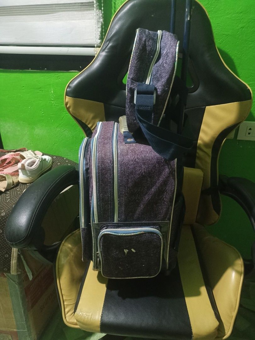 Preloved Frozen Roller Backpack and Lunch Bag Set (Category: Backpacks) located in Tarlac. Submitted by allinoneshop2178 (Listing ID 1467726279, Image 3). Description: - Official Frozen design featuring Anna and Elsa on purple denim-look fabric - Complete 2-in-1 set: rolling school bag and matching lunch bag - Lunch bag conveniently attaches to the main trolley handle - Smooth-rolling durable wheels with a sturdy telescopic handle - Spacious zipp