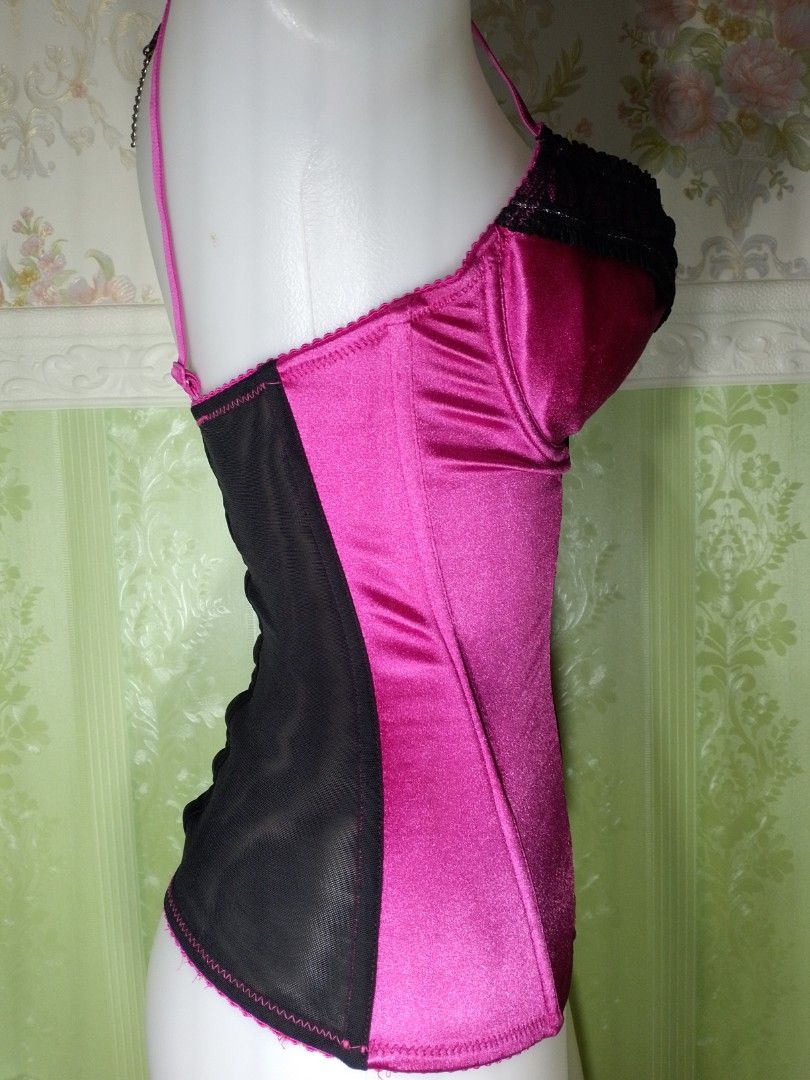 Preloved Short Stories Corset Top 32D (Category: Others Tops) located in Dasmarinas. Submitted by ms.happycorsets (Listing ID 1467749485, Image 3). Description: Preloved Corset Top Black and Dark pink Color Can Fit Small size Starting waistline 25-28 inches Padded bra with under wire 32 D length 19 inches StretchableFabric Has 3 layers of adjustable hooks at the back Has Front 4 Soft bones with Slight flaws has blue color transfer in the front pa