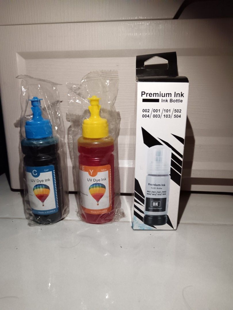 Premium Ink Refill Bottles UV Dye Ink (Category: Printers, Scanners & Copiers) located in Manila. Submitted by oreobao (Listing ID 1467626792, Image 3). Description: - Premium UV dye ink made in Korea for vivid and long-lasting prints - Complete set includes Cyan, Yellow (plastic-wrapped), and Black (boxed) - Compatible with various printer models (check box for specific compatibility) - Take all for 250 - Brand new and high quality.