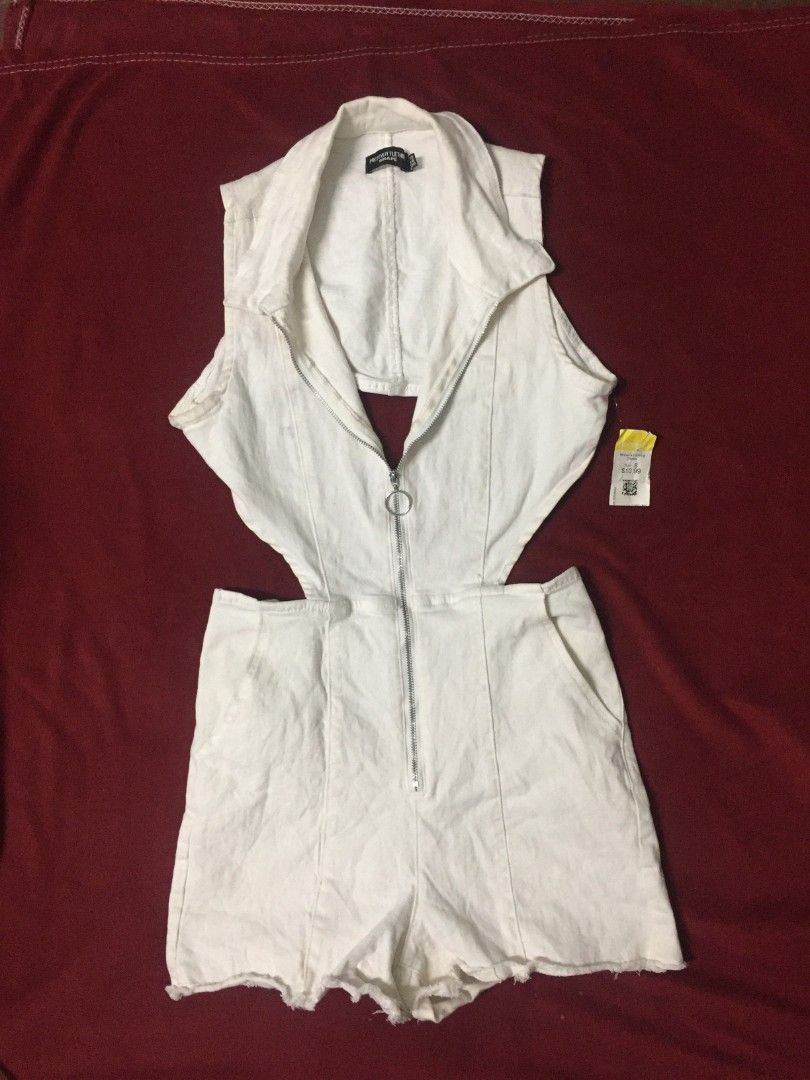 [PrettyLittleThing] Cut Out Denim Romper (Category: Rompers) located in Valenzuela. Submitted by xellexoxo (Listing ID 1467808311, Image 2). Description: DETAILS: ☆ Brand: PrettyLittleThing from Goodwill ☆ Style: Cut-out romper ☆ Color: White ☆ Size: M to L 28-32 inch waist 29 inch length 14 inch from waist ☆ Condition: In good condition. Has removable stains. Wash before use..