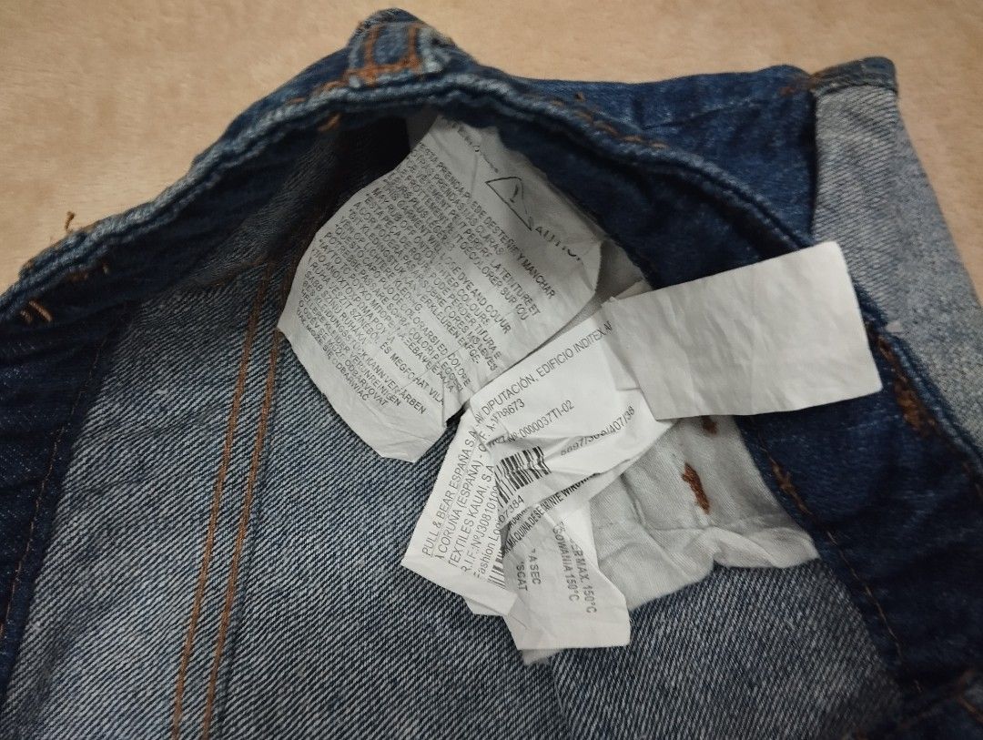 Pull & Bear Denim Shorts Distressed Rolled Cuff Size 30 (Category: Shorts) located in Dagupan City. Submitted by nartleb_naan (Listing ID 1467651723, Image 3). Description: - Brand: Pull & Bear - Size: 38 - Wash: Dark wash denim - Details: Distressed front and back pockets with rolled cuffs - Fit: Button closure with belt loops - Material: Comfortable cotton blend - Condition: Great casual piece for warmer weather.