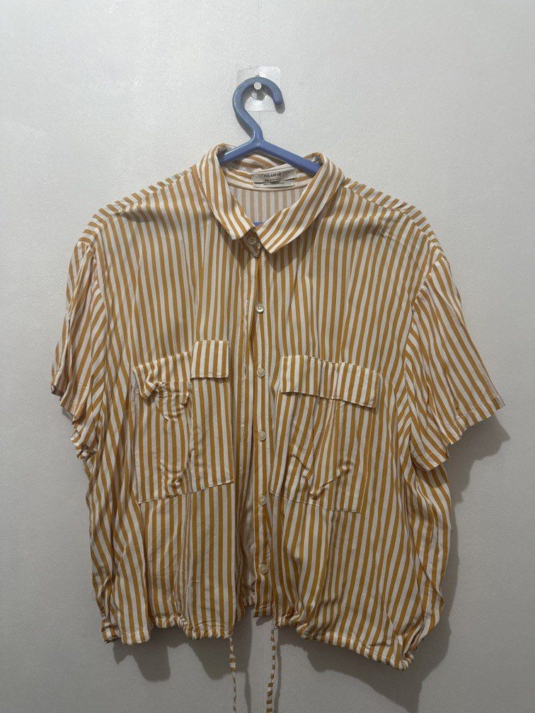 Pull&Bear Yellow Stripes Polo (Category: Blouses) located in Valenzuela. Submitted by lumaph (Listing ID 1467744559, Image 1). Description: .
