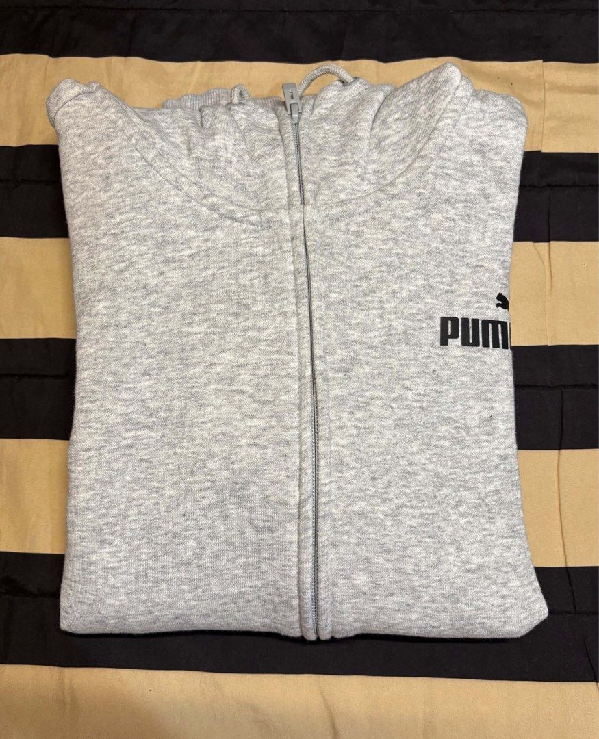 Puma Jacket/Hoodie (Category: Coats, Jackets and Outerwear) located in Pasay City. Submitted by faye_xoxo (Listing ID 1467731578, Image 1). Description: - Brand: Puma - Style: Zip-up hoodie with drawstring - Color: Heather grey with classic black chest logo - Size: XS (interior tag) - brand new, NO FLAWS! .