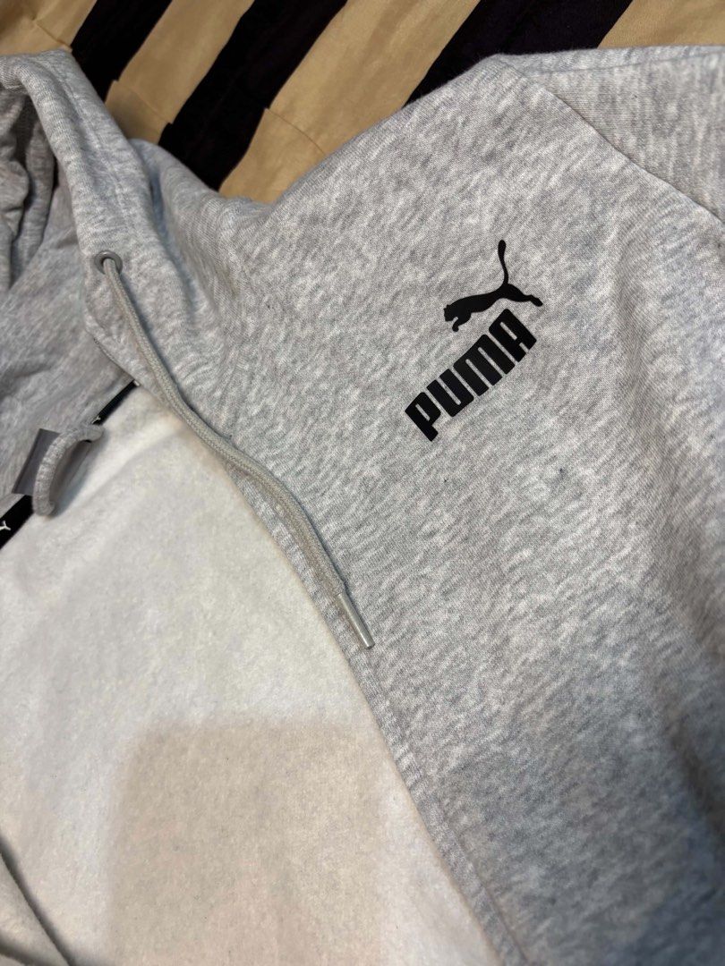 Puma Jacket/Hoodie (Category: Coats, Jackets and Outerwear) located in Pasay City. Submitted by faye_xoxo (Listing ID 1467731578, Image 3). Description: - Brand: Puma - Style: Zip-up hoodie with drawstring - Color: Heather grey with classic black chest logo - Size: XS (interior tag) - brand new, NO FLAWS! .