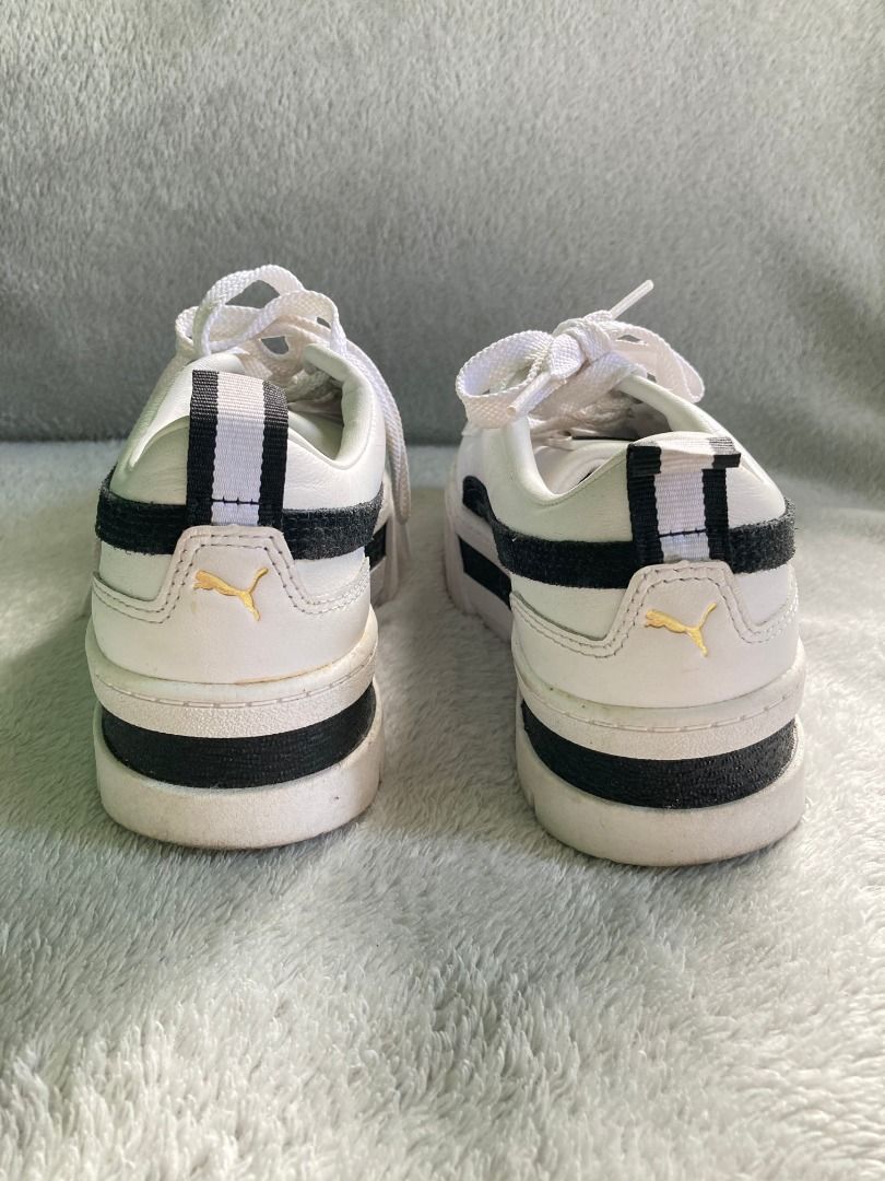 Puma Mayze Platform White Black Sneakers (Category: Sneakers) located in Rizal. Submitted by sheeraay (Listing ID 1467707945, Image 3). Description: - Brand: Puma - Style: Platform chunky sneakers with stacked sole - Color: White with black suede formstrip and gold foil logo branding - Size: US 5.5 / UK 3 / EUR 35.5 - Closure: Regular lace-up - Condition: Uppers are very clean; moderate wear on outsoles -Used twice only -with box.