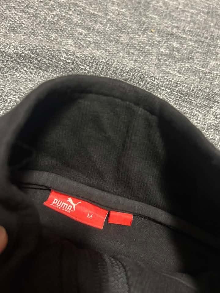 Puma Sport quarter-zip pullover with a half-zip front, (Category: Coats, Jackets and Outerwear) located in Manila. Submitted by thriftedbykab (Listing ID 1467719812, Image 2). Description: -Brand: PUMA SPORT -COMPLETE TAGS -Size: (M) -Width: 21 | Length: 26 -Condition: AS NEW -Color Rate:9.8/10 -Issue: DISCOLORATION.