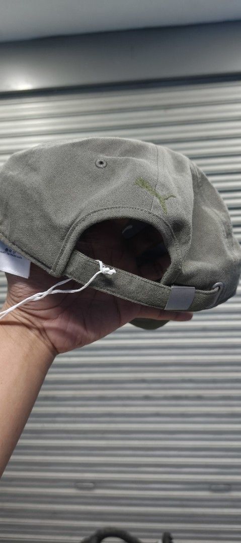 Puma x Represent Olive Green Baseball Cap (Category: Caps & Hats) located in Zamboanga. Submitted by benbryanab14320 (Listing ID 1467790612, Image 2). Description: - Brand: Puma x Represent collaboration - Color: Olive green - Style: Classic curved brim with embroidered front and back logos - Material: 100% cotton - Fit: Adjustable strap with metal clasp - Condition: used once , with original store tags .