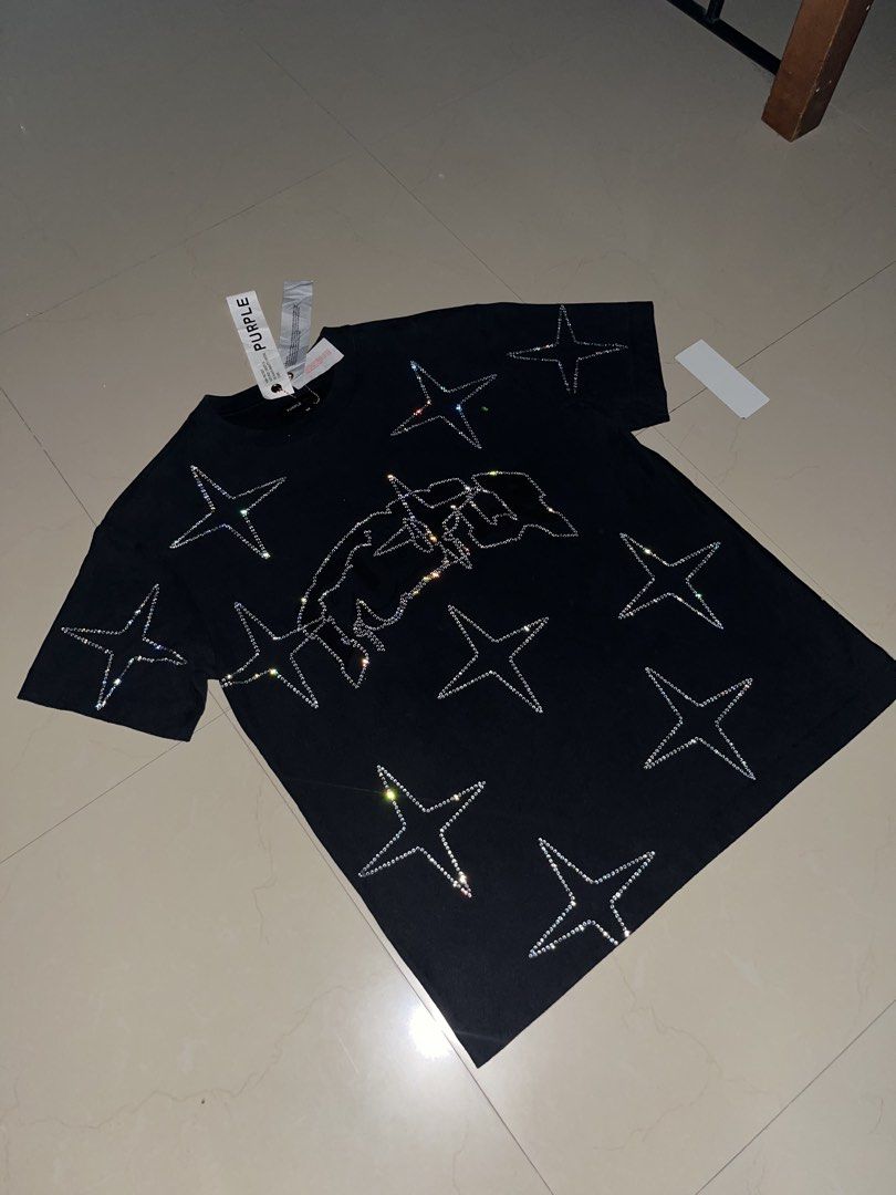 Purple Tee (Category: Tshirts & Polo Shirts ) located in Quezon. Submitted by gems_archive (Listing ID 1467732070, Image 2). Description: authentic purple Tee condition is 10/10 no missing Blings Medium on tag American Size / Fittings length 30 width 22 pm if interested.