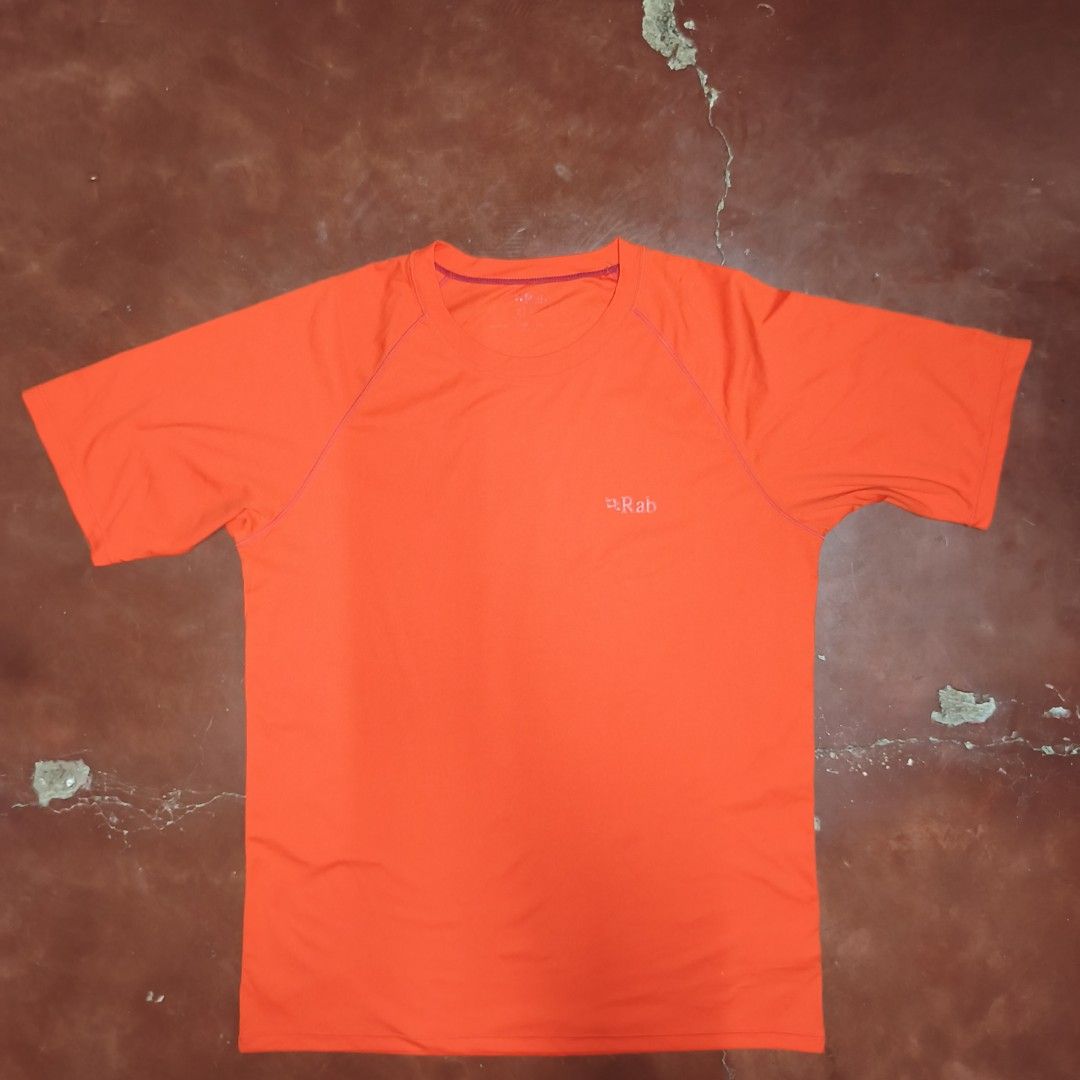 Rab Orange T-Shirt (Category: Activewear) located in Antipolo. Submitted by alphaomega_fox (Listing ID 1467714062, Image 1). Description: - Brand: Rab - Color: Bright orange - Size: UK M / US M, 20x27 - Material: Comfortable athletic fabric, dri fit - Features: Short sleeves, crew neck - Condition: excellent condition - Ideal for: Hiking, running, or casual outdoor days 800 plus sf.