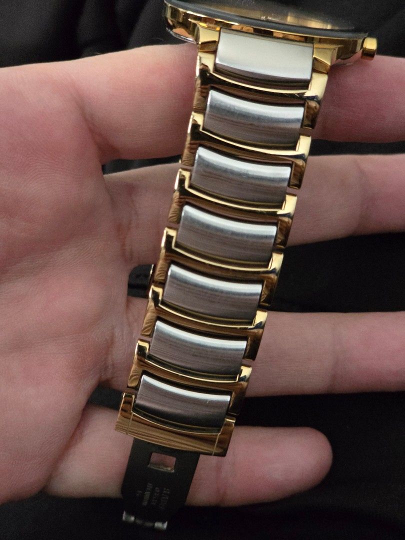 Rado Centrix two-tone (Category: Luxury Watches) located in Pasay City. Submitted by raf020 (Listing ID 1467668316, Image 2). Description: Selling my Rado Centrix with an elegant silver dial, two-tone gold and silver bracelet, and date display. Reference marking: 115.0931.3 Condition: Used, with visible scratches from normal wear Working condition: Working properly Inclusions: Watch only (no box or papers) Water resistance marking: 3 bar / 30 m P
