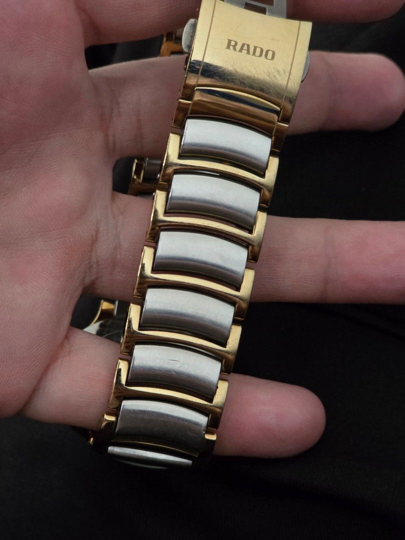Rado Centrix two-tone (Category: Luxury Watches) located in Pasay City. Submitted by raf020 (Listing ID 1467668316, Image 3). Description: Selling my Rado Centrix with an elegant silver dial, two-tone gold and silver bracelet, and date display. Reference marking: 115.0931.3 Condition: Used, with visible scratches from normal wear Working condition: Working properly Inclusions: Watch only (no box or papers) Water resistance marking: 3 bar / 30 m P