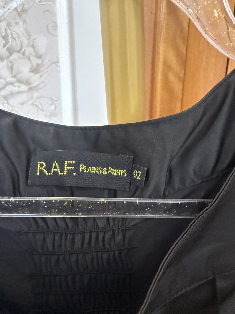 RAF: Romper in Black (Category: Rompers) located in Quezon City. Submitted by vpauline (Listing ID 1467624007, Image 2). Description: 10/10.