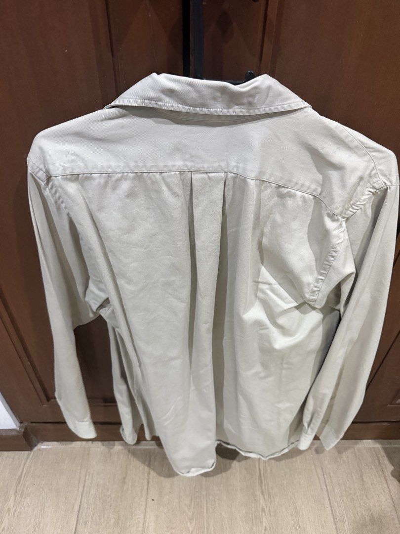 Ralph Lauren Button Down Shirt Beige Size M (Category: Tshirts & Polo Shirts ) located in Manila. Submitted by p4t4kyv7dd43387 (Listing ID 1467612543, Image 3). Description: - Brand: Ralph Lauren - Color: Classic beige - Size: Medium (M) - Material: 100% breathable cotton - Features: Long sleeves, standard collar, signature embroidered pony logo - Style: Versatile for casual outings or smart-casual looks - Condition: Excellent.