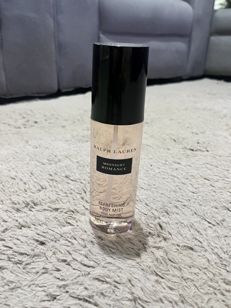 Ralph Lauren Midnight Romance Refreshing Body Mist 150ml (Category: Fragrance & Deodorants) located in Manila. Submitted by lovedbynixe (Listing ID 1467751809, Image 1). Description: Ralph Lauren Brand new Authentic ₱500 Loc pampanga Mop gcash - Product: Midnight Romance Body Mist - Scent Profile: Dark floral with notes of pink peony and vanilla - Authenticity: Batch code 18N5002 stamped on the bottom .