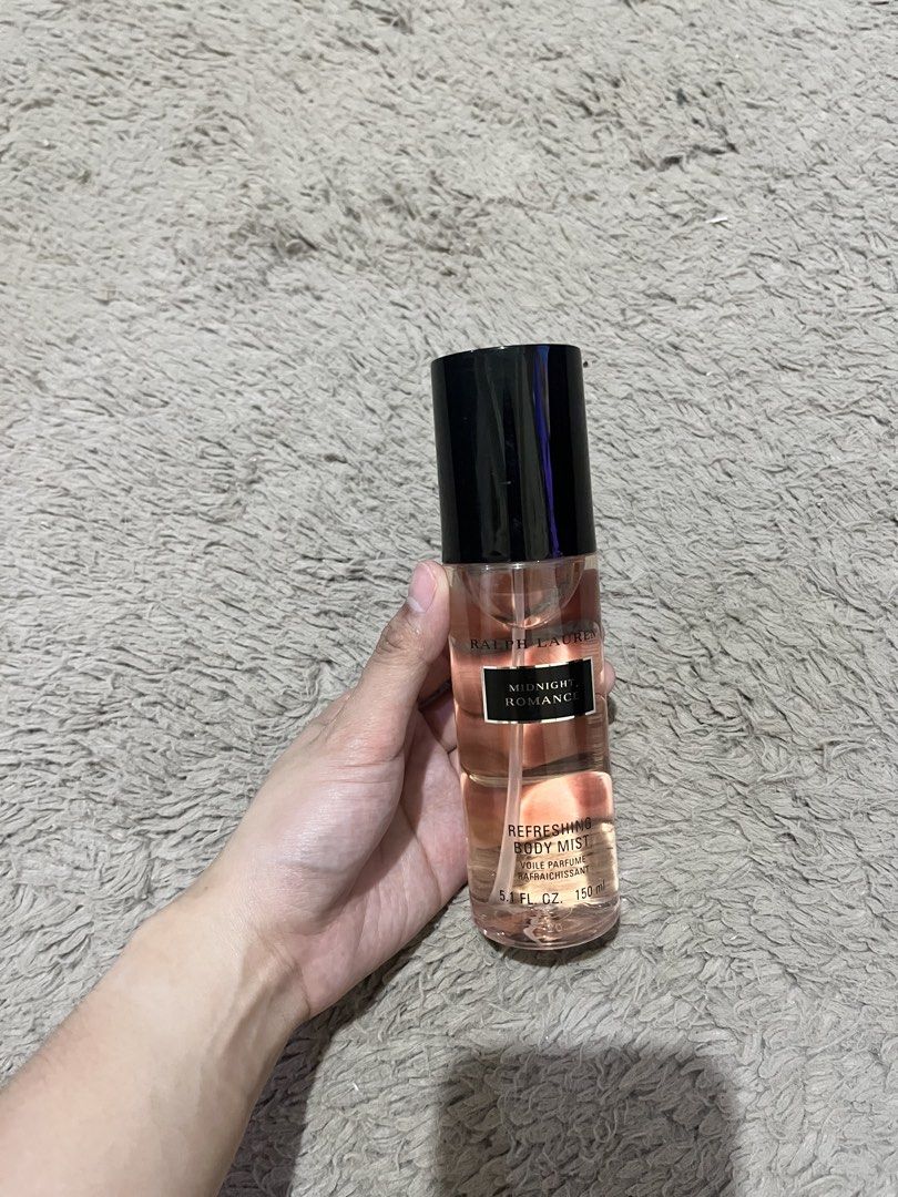 Ralph Lauren Midnight Romance Refreshing Body Mist 150ml (Category: Fragrance & Deodorants) located in Manila. Submitted by lovedbynixe (Listing ID 1467751809, Image 2). Description: Ralph Lauren Brand new Authentic ₱500 Loc pampanga Mop gcash - Product: Midnight Romance Body Mist - Scent Profile: Dark floral with notes of pink peony and vanilla - Authenticity: Batch code 18N5002 stamped on the bottom .