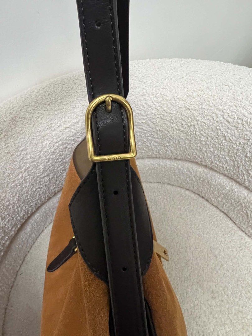 Ralph Lauren Polo Bag (Category: Luxury Bags & Wallets) located in Abulug. Submitted by jamiecammie (Listing ID 1467615824, Image 3). Description: - Brand: Polo Ralph Lauren - Material: Rich brown suede with dark leather trim - Hardware: Gold-tone with engraved rider logo front plaque - Strap: Adjustable for comfortable shoulder wear - Interior: Clean and spacious for daily essentials - Design: Structured base with classic equestrian style.