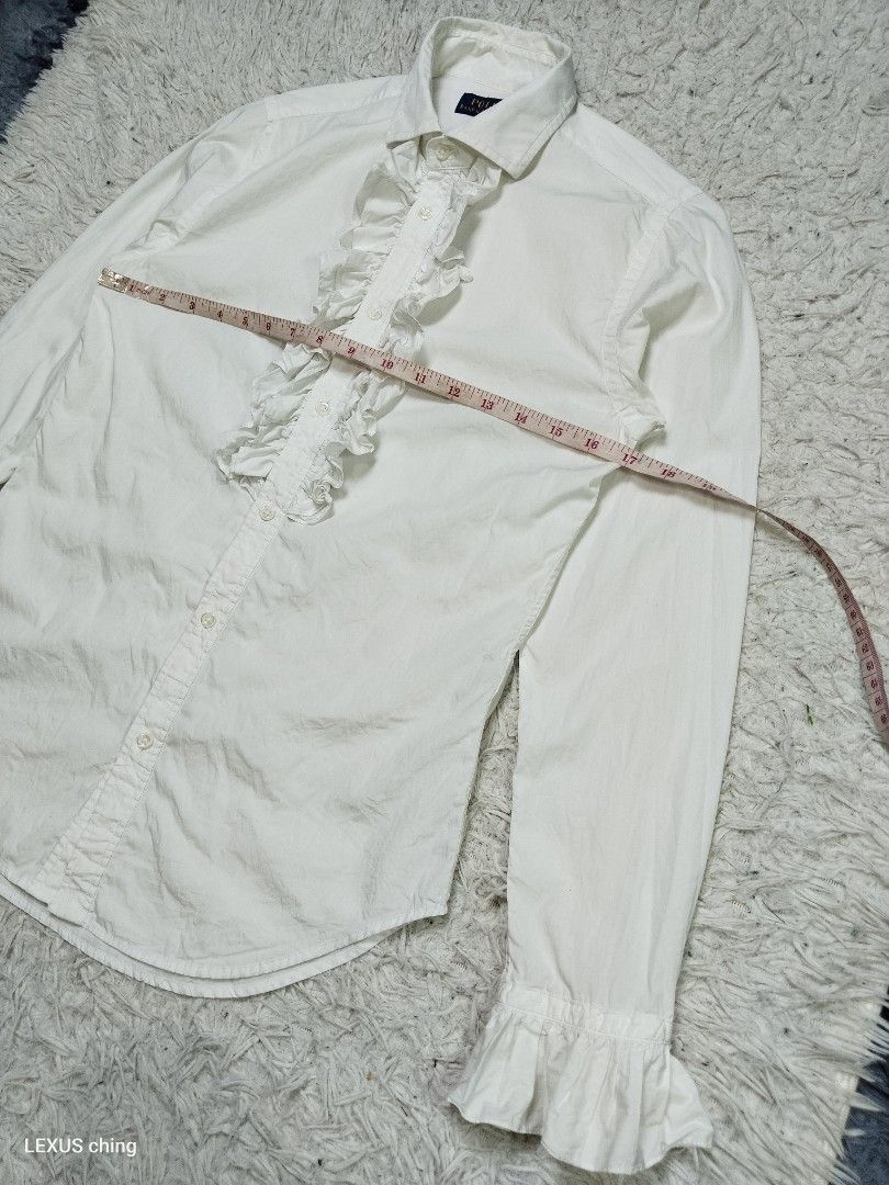 Ralph Lauren womens ruffled button down Size 2 on tag. (Category: Sleeveless) located in Manila. Submitted by lexusthrift1995 (Listing ID 1467787562, Image 2). Description: Size- 2 on tag but fit to SMALL Dimension- 17x25.5 Color rate- 9/10 Condition- 9/10 issue- no issue but need wash good condition ‼️300.pesos plus shipping fee 💸MODE OF PAYMENT- GCASH payment first 🚛MODE OF DELIVERY- J&T or LALAMOVE 📍LOCATION- NORTH CALOOCAN CAMARIN BRGY.177