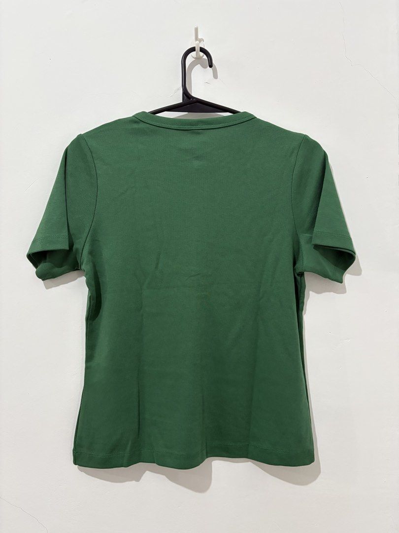 RARE Collection Green and Maroon Ribbed Tops Bundle (Category: Blouses) located in Manila. Submitted by coolphoenix_f1e702 (Listing ID 1467732665, Image 2). Description: - Brand: RARE Collection - Size: XL - Body Hugging - Quantity: Bundle of 2 tops - Item 1: Classic green button-down tee - Item 2: Maroon peplum top with puff sleeves, chest cutout, and front hook-and-eye closures - Condition: Brand new with tags (BNWT), pristine and unworn - Perf