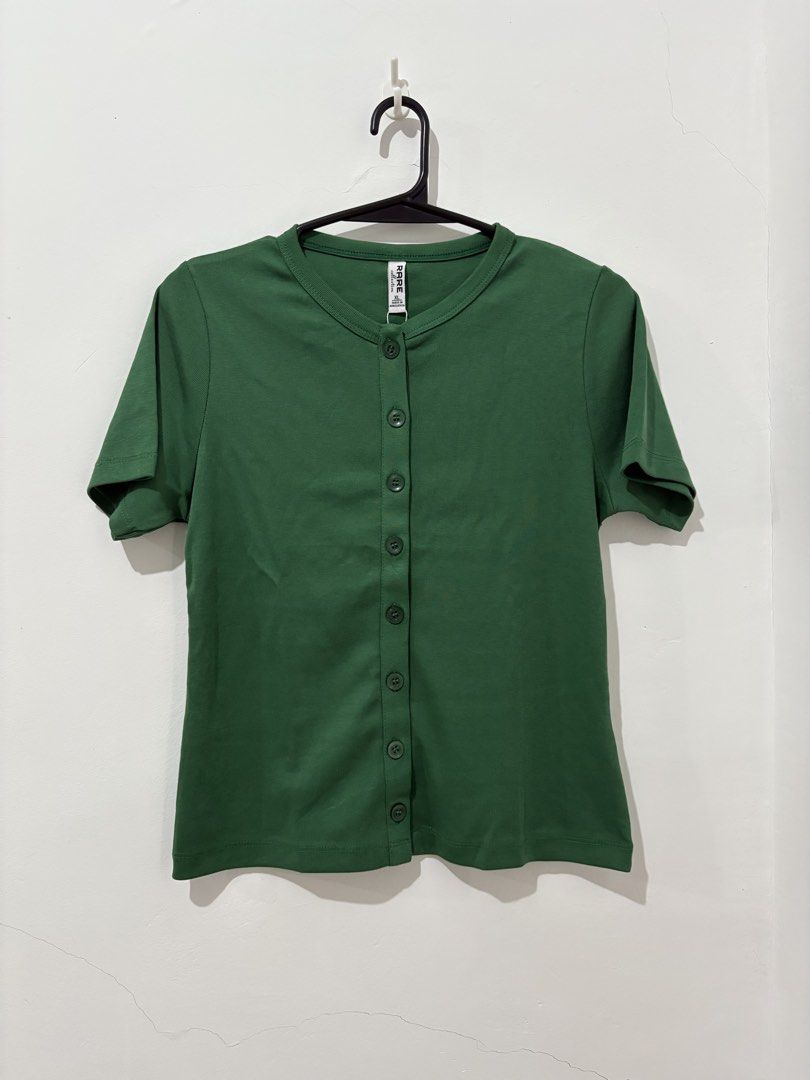 RARE Collection Green and Maroon Ribbed Tops Bundle (Category: Blouses) located in Manila. Submitted by coolphoenix_f1e702 (Listing ID 1467732665, Image 1). Description: - Brand: RARE Collection - Size: XL - Body Hugging - Quantity: Bundle of 2 tops - Item 1: Classic green button-down tee - Item 2: Maroon peplum top with puff sleeves, chest cutout, and front hook-and-eye closures - Condition: Brand new with tags (BNWT), pristine and unworn - Perf