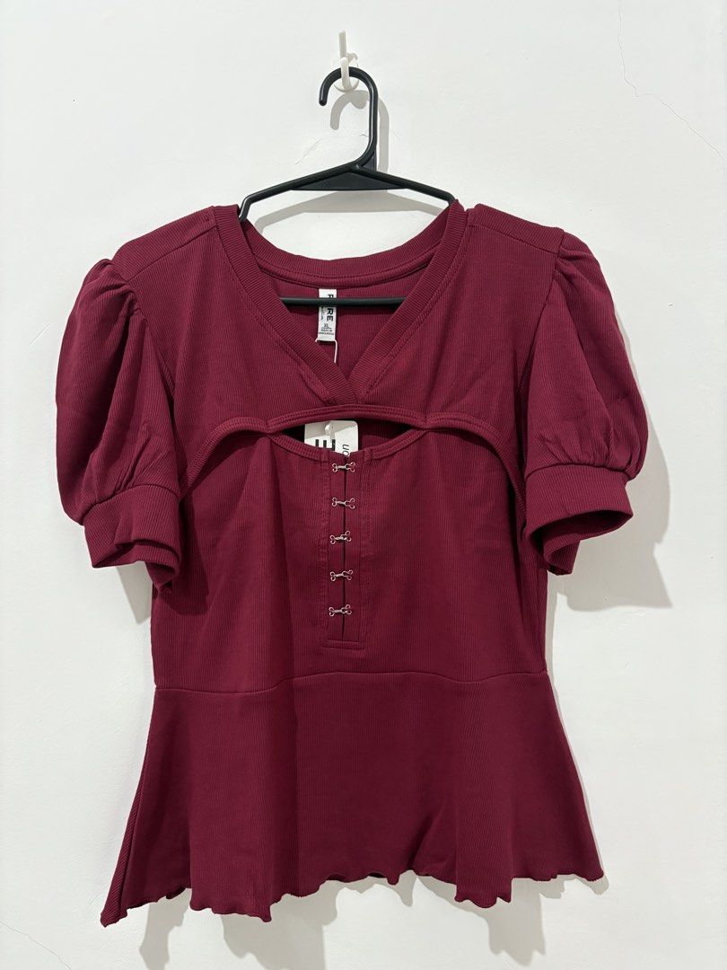 RARE Collection Green and Maroon Ribbed Tops Bundle (Category: Blouses) located in Manila. Submitted by coolphoenix_f1e702 (Listing ID 1467732665, Image 3). Description: - Brand: RARE Collection - Size: XL - Body Hugging - Quantity: Bundle of 2 tops - Item 1: Classic green button-down tee - Item 2: Maroon peplum top with puff sleeves, chest cutout, and front hook-and-eye closures - Condition: Brand new with tags (BNWT), pristine and unworn - Perf