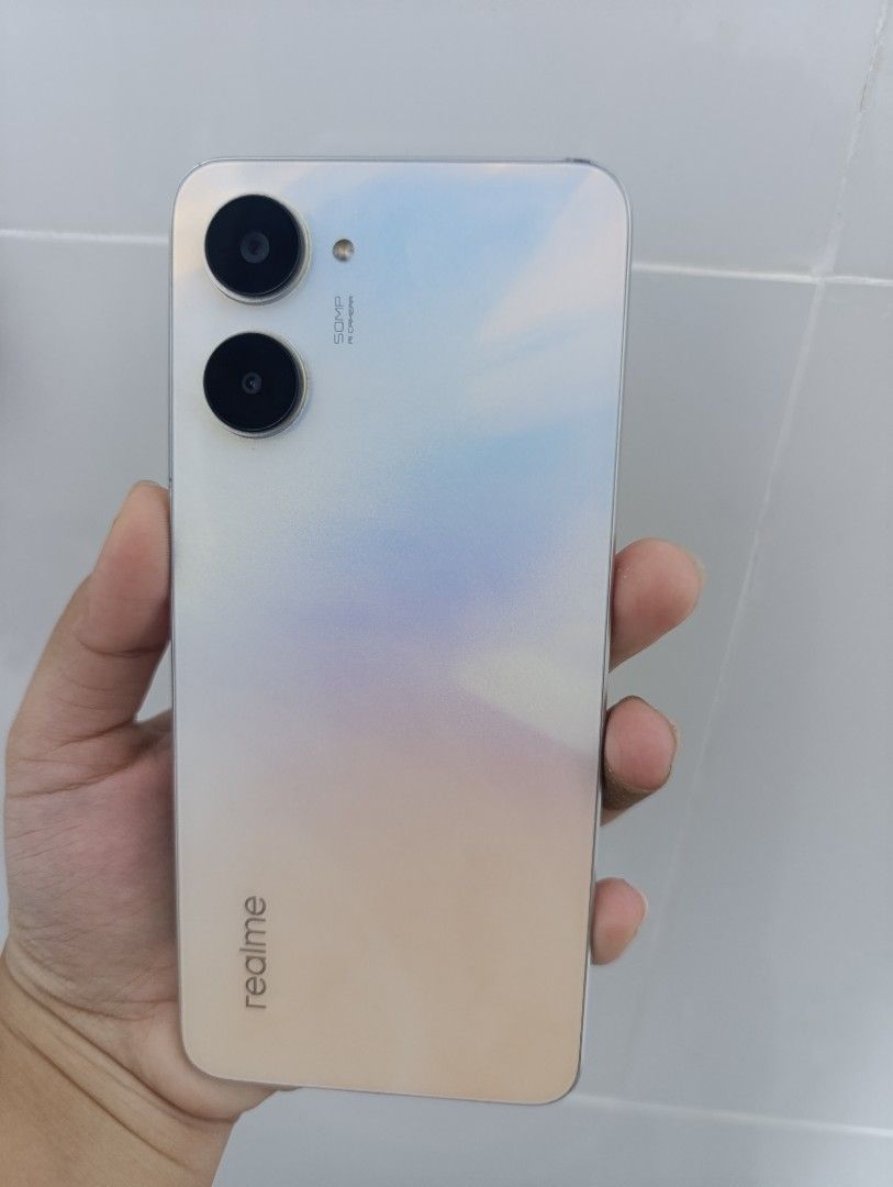 Realme 10 (Category: Realme) located in Quezon City. Submitted by izel_bianca (Listing ID 1467774617, Image 3). Description: FOR SALE: realme 10 4G (Clash White) PRICE: ₱4,500. (NEGOTIABLE) QUICK SPECS: Storage/RAM: 256GB ROM / 8GB + 4GB Extended RAM (Napakalaki ng space, hindi bitin!) Processor: MediaTek Helio G99 (Sobrang smooth sa gaming at daily use) Display: 6.43" Super AMOLED 90Hz (Matingkad at napakalinaw ng screen) Battery: 5000 mAh Camer