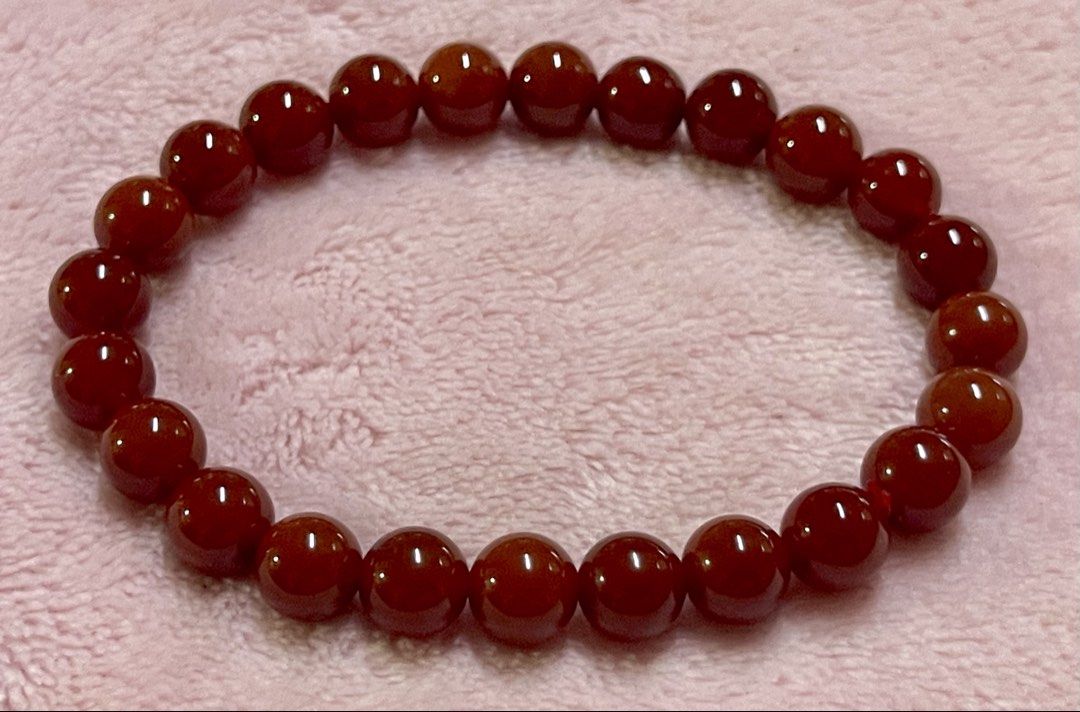 Red Agate Bracelet 8mm (Category: Bracelets) located in Manila. Submitted by Crystal_Oracle (Listing ID 1467644567, Image 1). Description: Red agate is a grounding stone that helps stabilize a person’s energy. It does this by absorbing excess energy and releasing it back to you when you need it most. The red color represents energy, so the stone has a warm, vibrant energy that can help calm your mind and promote feelings of stability and balance.