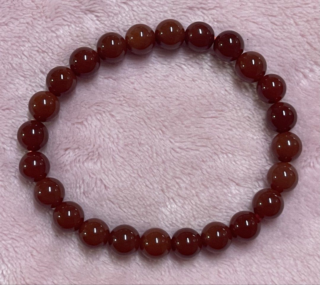 Red Agate Bracelet 8mm (Category: Bracelets) located in Manila. Submitted by Crystal_Oracle (Listing ID 1467644567, Image 2). Description: Red agate is a grounding stone that helps stabilize a person’s energy. It does this by absorbing excess energy and releasing it back to you when you need it most. The red color represents energy, so the stone has a warm, vibrant energy that can help calm your mind and promote feelings of stability and balance.