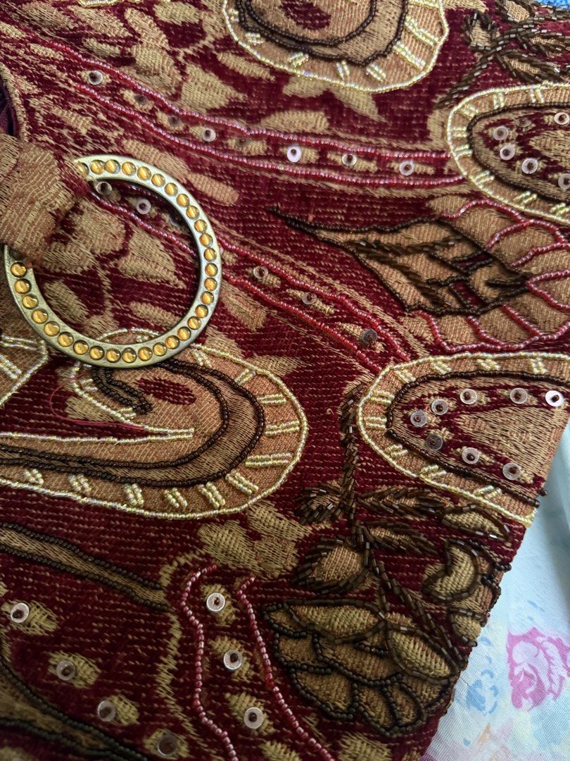 Red and Gold Tapestry Beaded Shoulder Bag (Category: Shoulder Bags) located in Cebu City. Submitted by hotchkisscebu (Listing ID 1467675765, Image 3). Description: - Eye-catching red and gold tapestry fabric with intricate beading and sequins - Chic single shoulder strap design - Sparkling rhinestone-studded ring clasp on the front flap - Convenient exterior zipper pocket on the back - Unique vintage look, perfect statement accessory for any outi