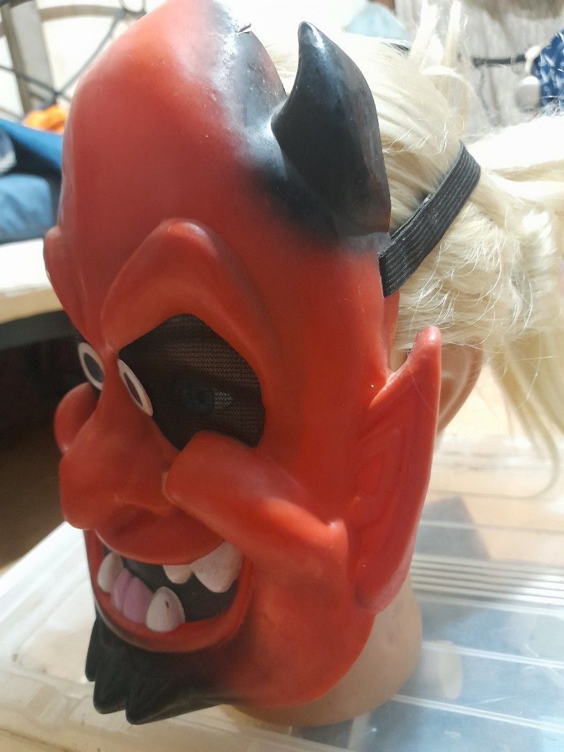 Red Devil Halloween Mask with Black Horns and Elastic Strap (Category: Occasions & Party Supplies) located in Bocaue. Submitted by marajapansurplus (Listing ID 1467717241, Image 3). Description: - Material: Durable, lightweight plastic - Design: Molded horns, pointed ears, and detailed teeth - Comfort & Safety: Mesh eye cutouts for clear visibility - Fit: Attached black elastic band for a secure fit - Perfect for: Halloween parties and trick-or-t
