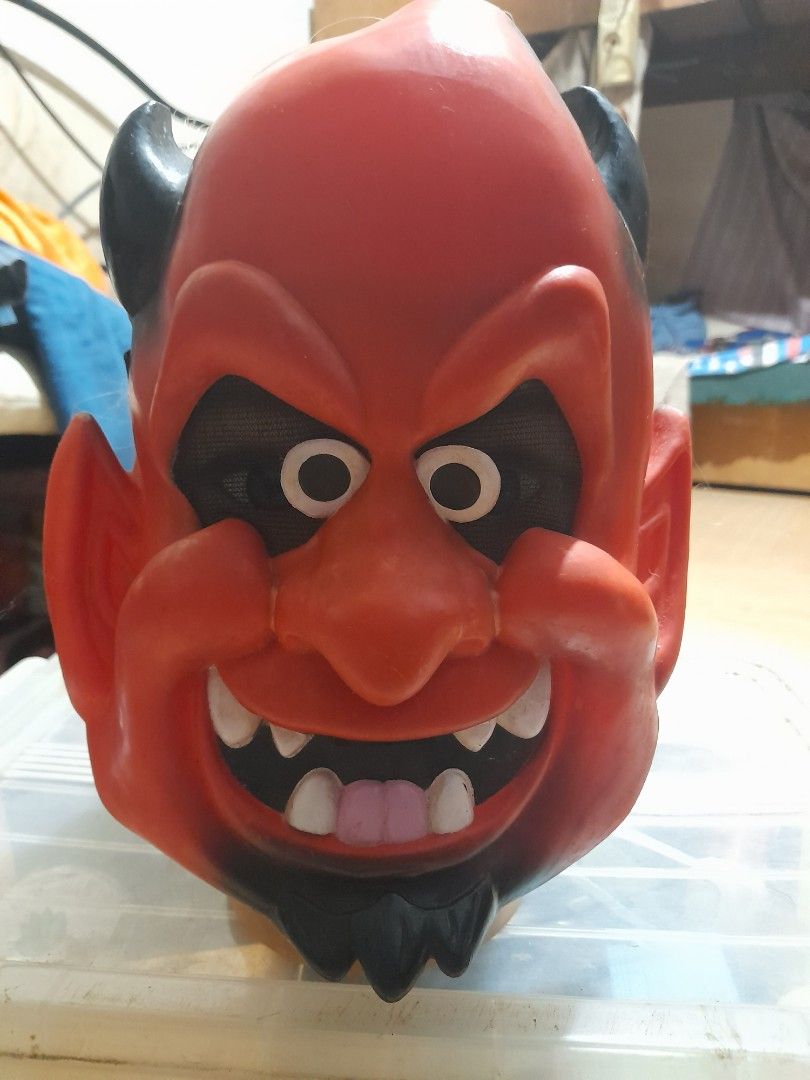 Red Devil Halloween Mask with Black Horns and Elastic Strap (Category: Occasions & Party Supplies) located in Bocaue. Submitted by marajapansurplus (Listing ID 1467717241, Image 1). Description: - Material: Durable, lightweight plastic - Design: Molded horns, pointed ears, and detailed teeth - Comfort & Safety: Mesh eye cutouts for clear visibility - Fit: Attached black elastic band for a secure fit - Perfect for: Halloween parties and trick-or-t