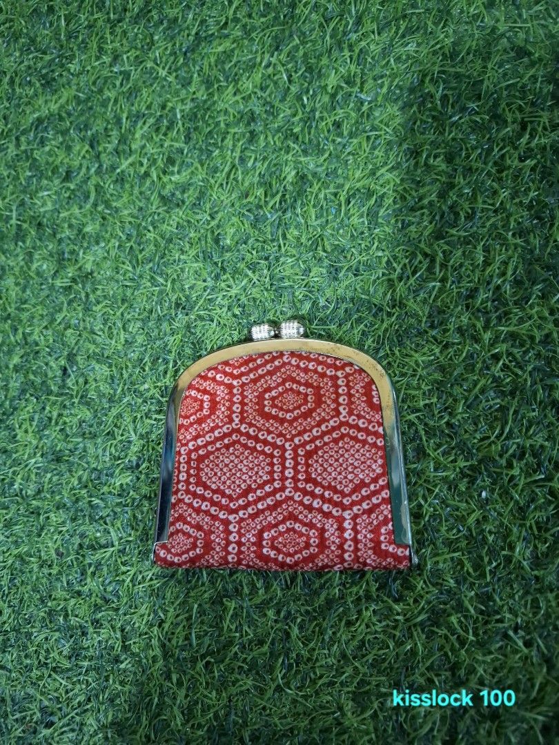 Red Japanese Pattern Kisslock Coin Purse (Category: Purses & Pouches) located in Pasay City. Submitted by emilia1102 (Listing ID 1467800829, Image 1). Description: - Traditional Japanese red fabric with a white geometric pattern - Secure metal kisslock frame with double bead closure - Compact size fits easily into pockets or small bags - Clean fabric interior - Perfect everyday accessory for coins, cards, or small items.