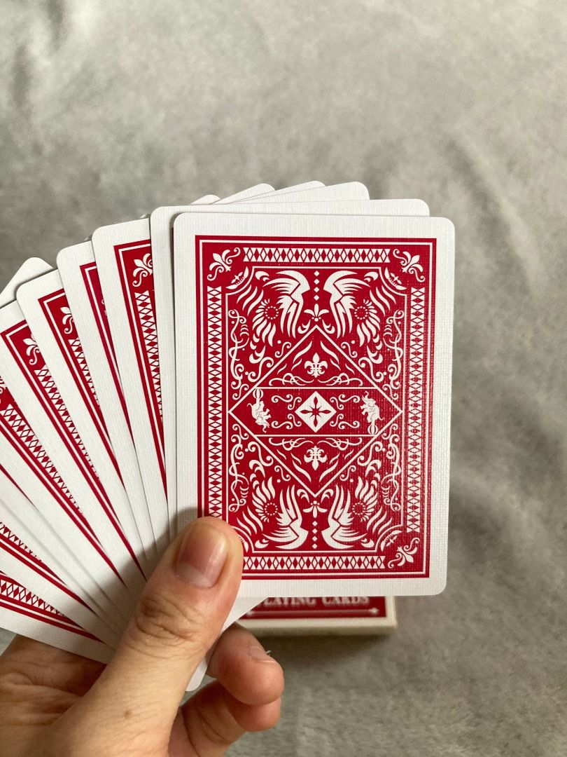 Red Playing Cards Deck (Category: Board Games & Puzzles) located in Rizal. Submitted by sheeraay (Listing ID 1467704657, Image 2). Description: - Classic red-back playing cards with matching red storage box - Features traditional court cards and standard numbered suits - Great for poker, magic tricks, card games, and collections - Clean, high-quality finish with detailed back patterns - Ready for shipping or meetups across the Philippines.