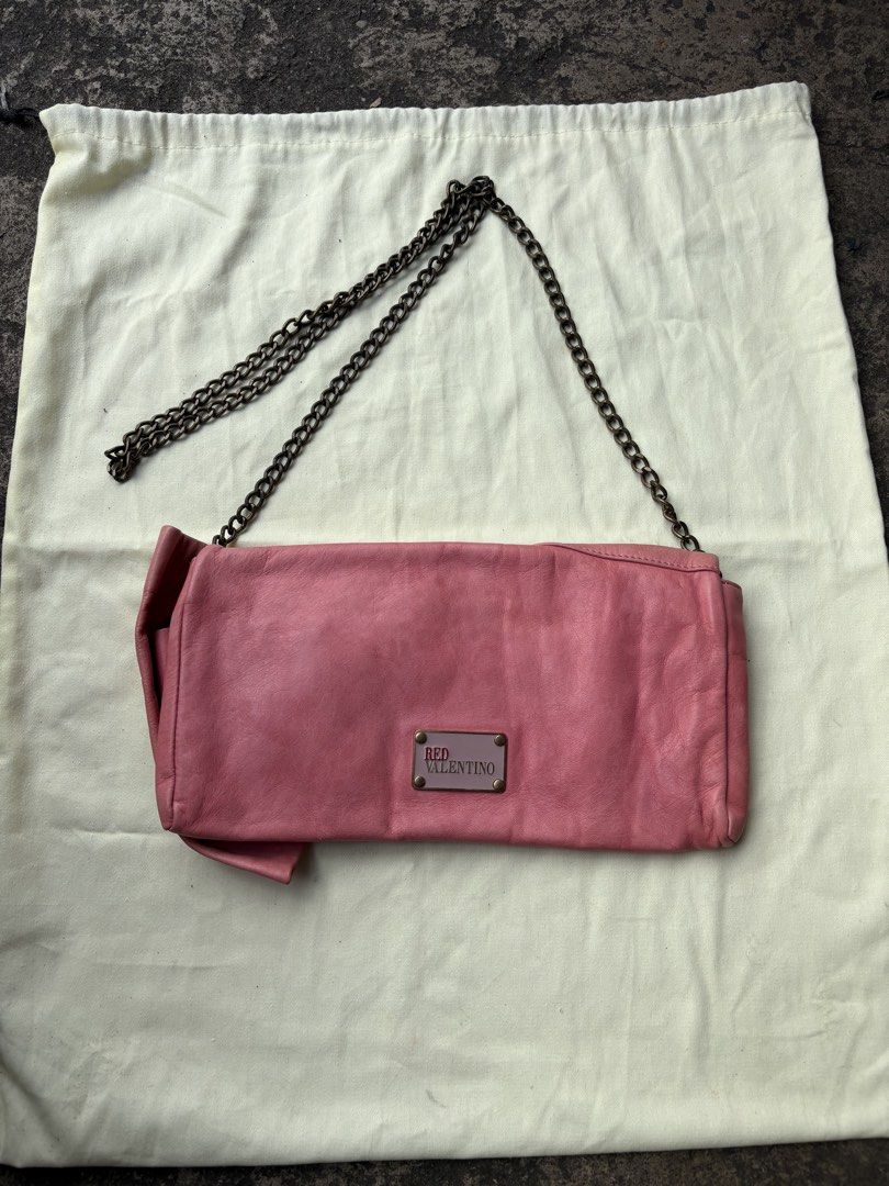 RED Valentino Pink Leather Bow Chain Bag (Category: Cross-body Bags) located in Baguio. Submitted by thriftedbaguio (Listing ID 1467730687, Image 1). Description: Very Good Condition Signs of use .
