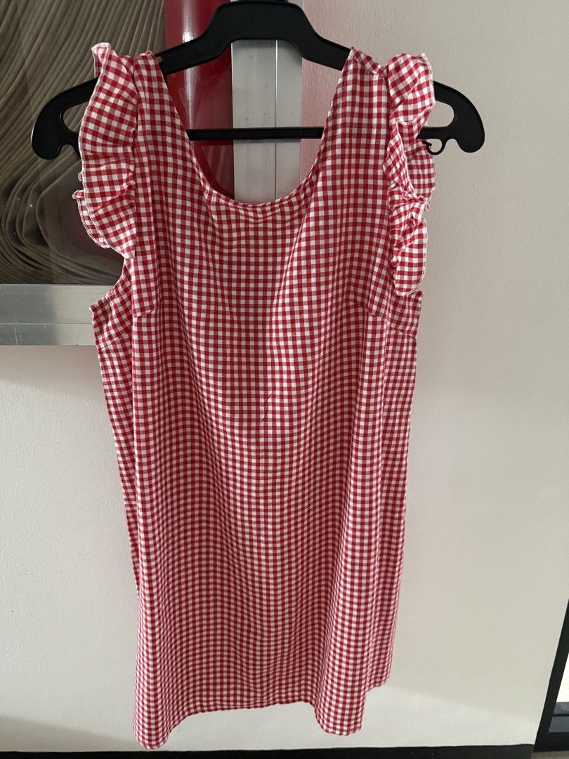 Red White Gingham Ruffle Sleeves Dress (Category: Dresses) located in Mandaluyong City. Submitted by declutteringmylife101 (Listing ID 1467680277, Image 1). Description: - Red and white gingham print mini dress - Ruffle cap sleeves for a sweet touch - V-neck back with functional white button closures - Lightweight fabric ideal for warm weather - Easy to throw on and style for casual outings.