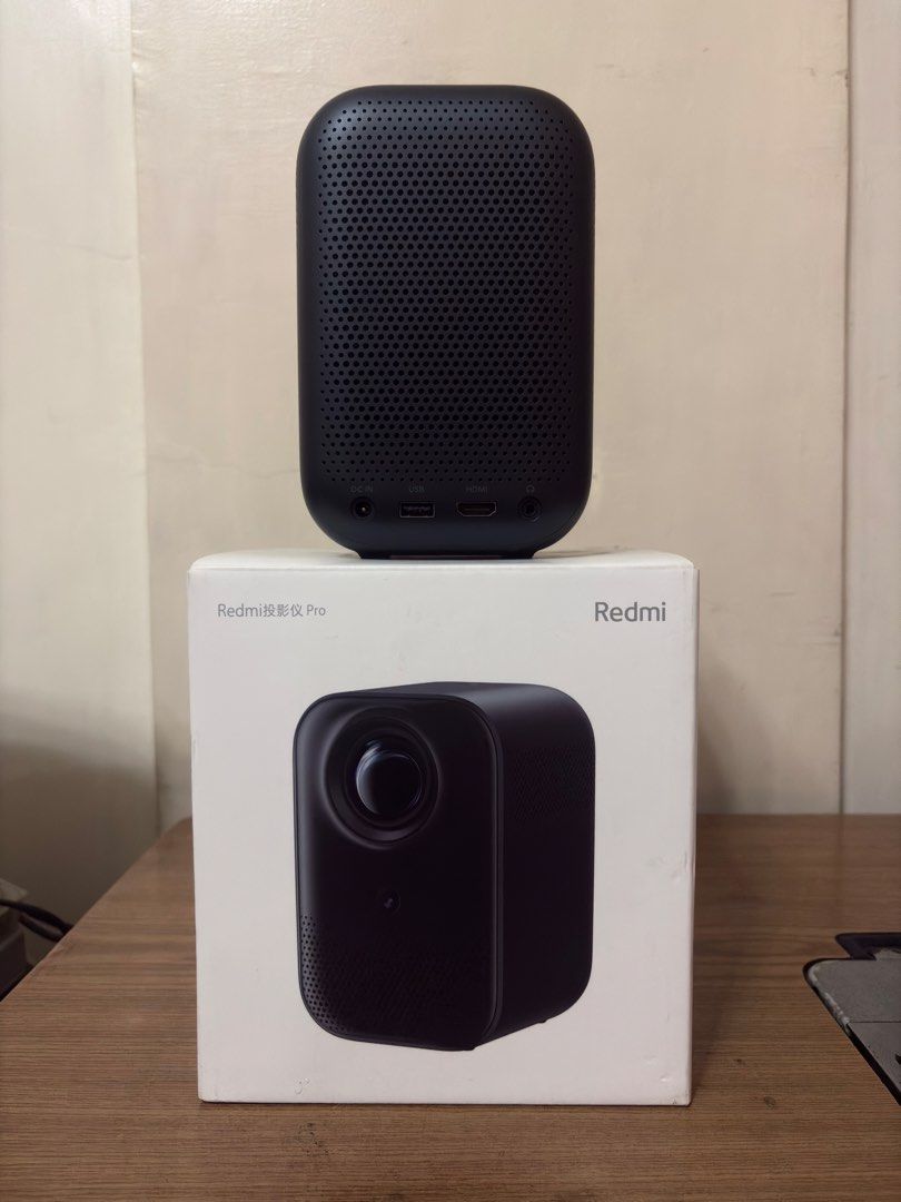 Redmi Projector (Category: Projectors) located in Manila. Submitted by chrsinyourarea (Listing ID 1467719187, Image 2). Description: Include Complete Original Packaging and Accessories Specifications: Maximum Compatible Resolution: 1920 × 1080 (Full HD) Brightness: 150 ANSI lumens Operating System: Android 11 Aspect Ratio: 16:9 WiFi: Supported Keystone Correction: Four Way Correction Auto Focus: Supported HDMI: HDMI 1.4 USB: USB 2.0 Color: Black 