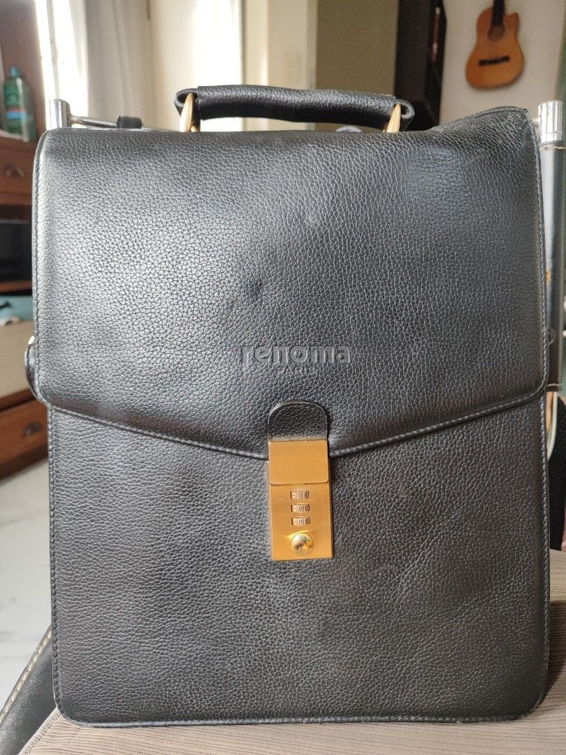 Renoma bag (Category: Luxury Bags & Wallets) located in Consolacion. Submitted by apoor_nursingstudent (Listing ID 1467665643, Image 1). Description: Renoma ukay find. Declared off. minor leather chips sa ubos. working lock mechanisms. bawal sa maarte 🤭.